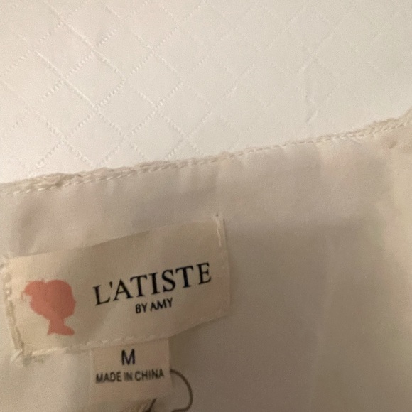 Medium size Jumper by L’atiste in a Lacey ivory coloured finish with belt straps - Picture 9 of 9